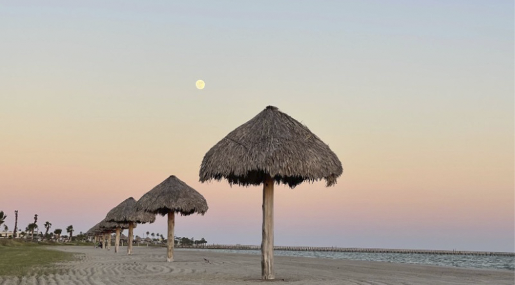 Moon Over Palapas at Rockport Beach