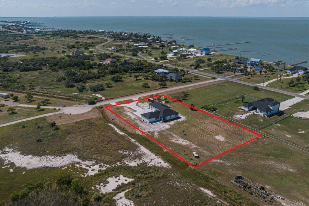 Aerial View of Property with Copano Bay View 104 Windcrest, Rockport, TX